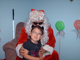 Santa posing with a girl